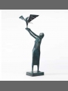 Woman Releasing Bird by Terence Coventry