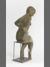 Woman Undressing by Terence Coventry