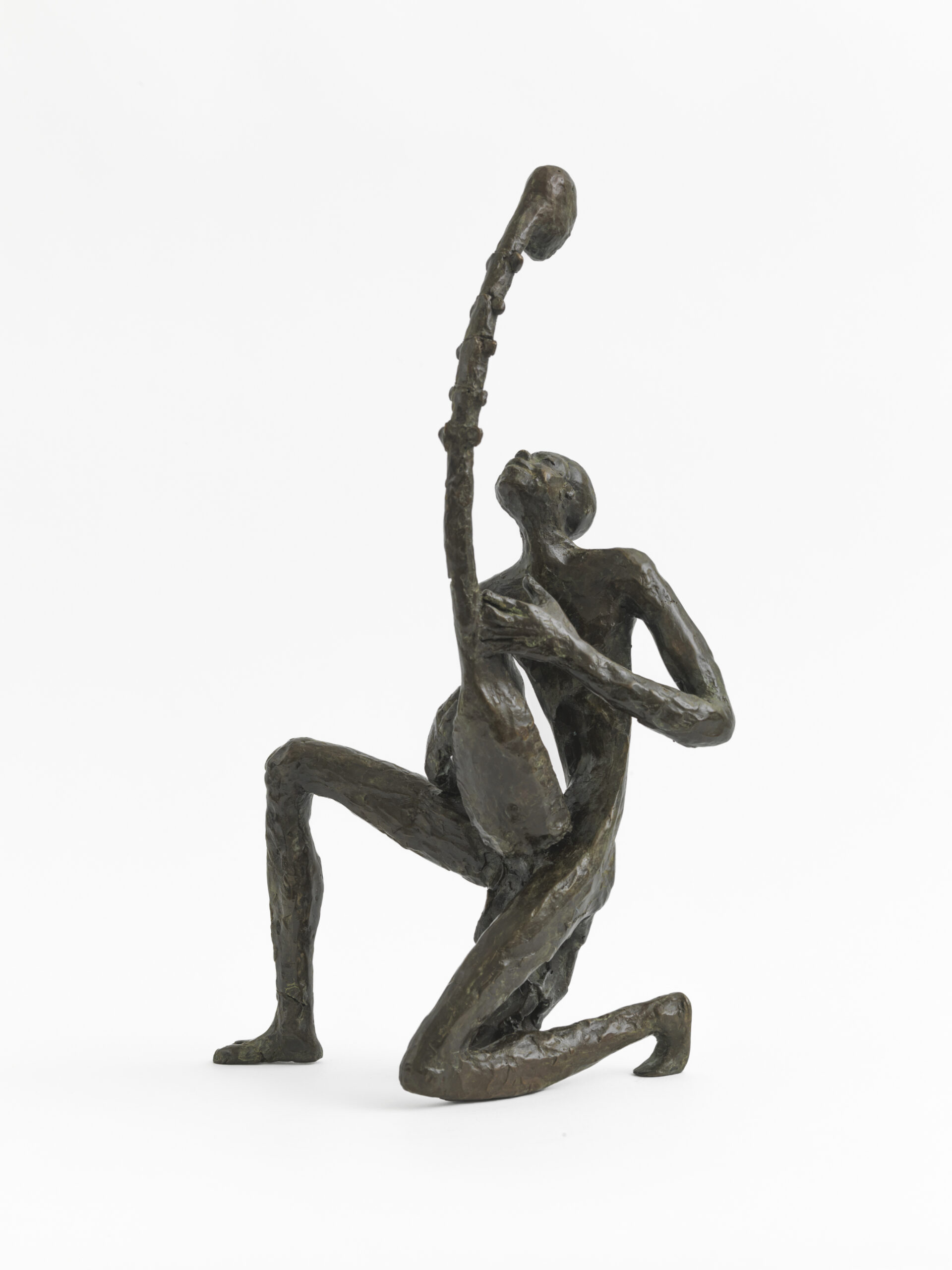 Culture and Modernity: Man Playing the Adungu